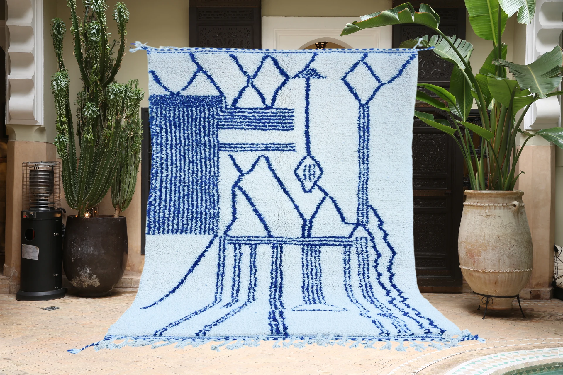 Azilal Moroccan rug &mdash; single-knot wool with painterly free-form motifs